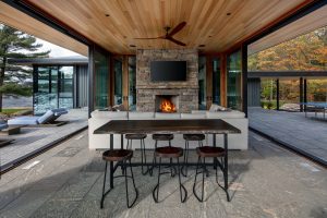 Cottage Living Room Design with Sliding Glass Walls